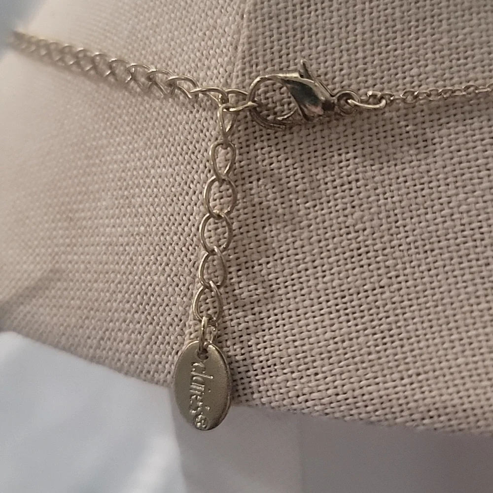 Claires Gold Tone Airplane Necklace with Pink Heart Charm